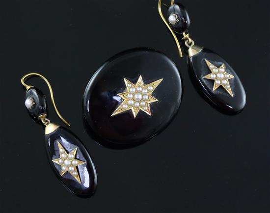 A suite of Victorian gold mounted black onyx and split pearl jewellery, comprising a brooch and pair of drop earring, brooch 39mm.